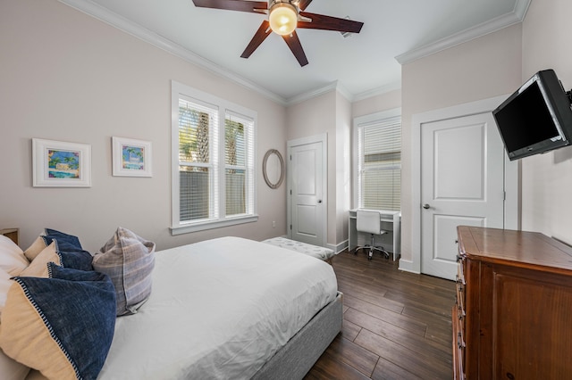 bedroom with dark hardwood / wood-style flooring, ornamental molding, and ceiling fan