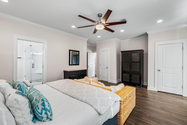 bedroom with crown molding, ensuite bathroom, ceiling fan, and dark hardwood / wood-style flooring