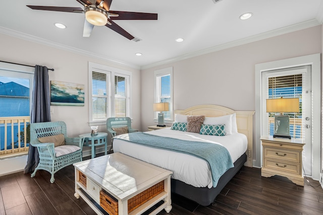 bedroom featuring crown molding, dark hardwood / wood-style floors, and ceiling fan