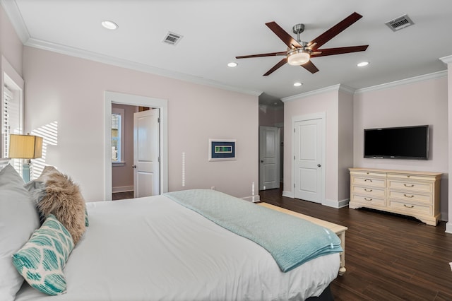 bedroom with crown molding, dark wood-type flooring, and ceiling fan