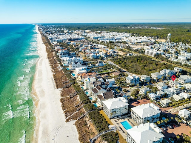 bird's eye view with a beach view and a water view