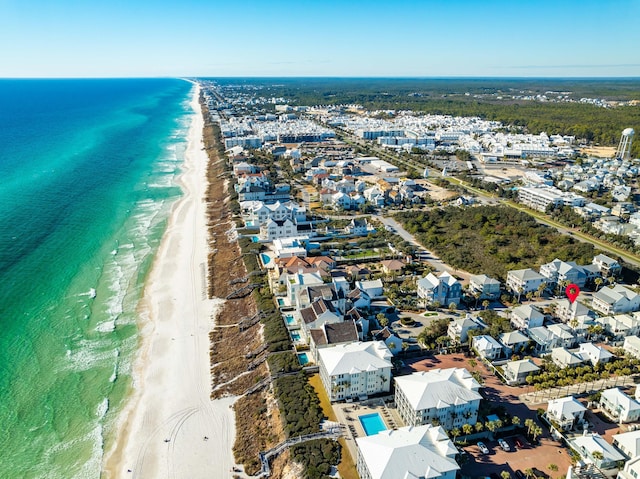 bird's eye view with a view of the beach and a water view