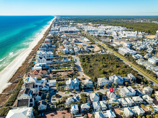 aerial view with a beach view and a water view