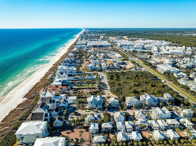 bird's eye view with a water view and a view of the beach