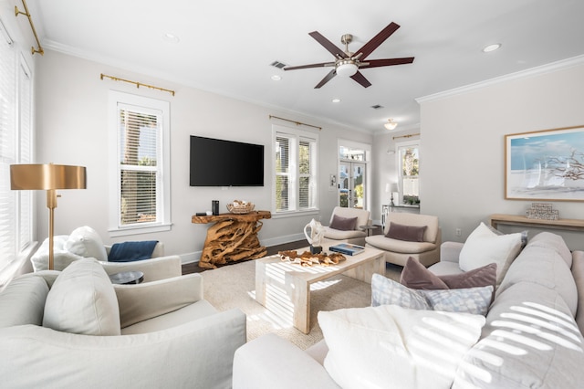 living room featuring crown molding, ceiling fan, and hardwood / wood-style flooring