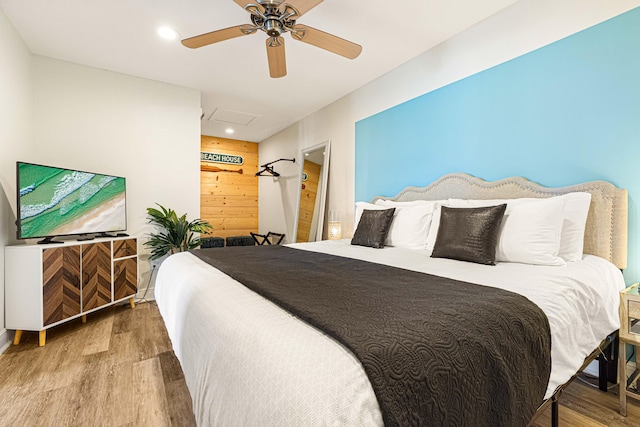 bedroom featuring hardwood / wood-style floors and ceiling fan