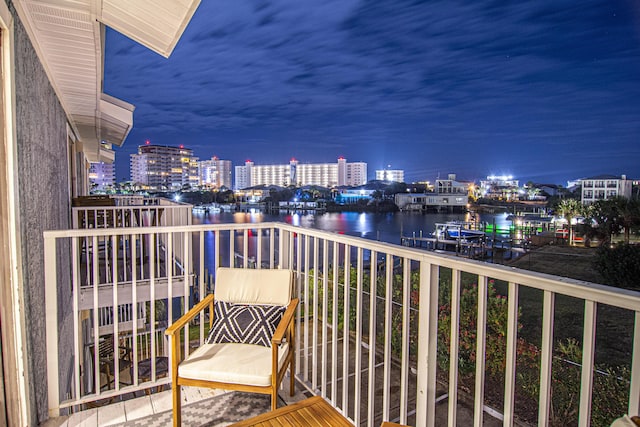 balcony at night with a water view