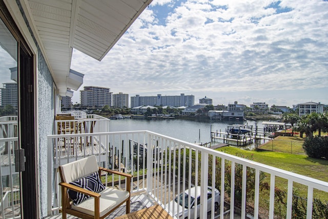 balcony featuring a water view