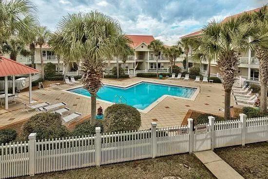 view of swimming pool with a gazebo and a patio