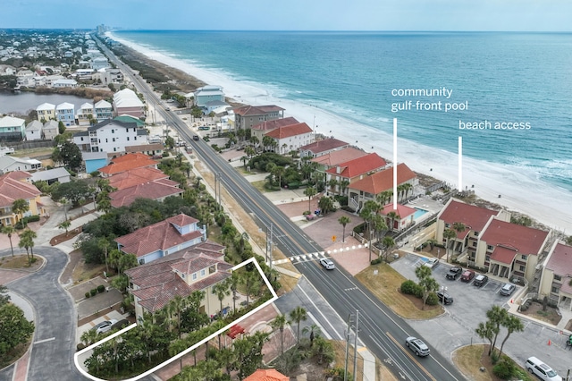 aerial view with a view of the beach and a water view