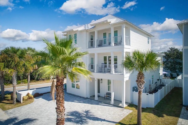 view of front of home with a balcony