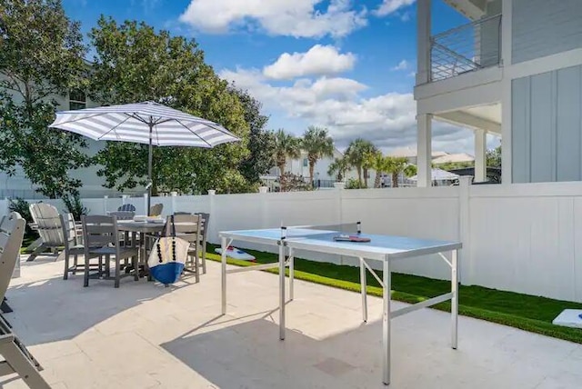 view of patio / terrace featuring a balcony