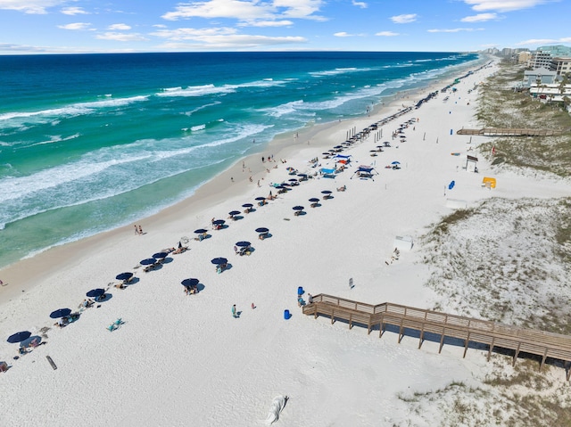 bird's eye view with a view of the beach and a water view