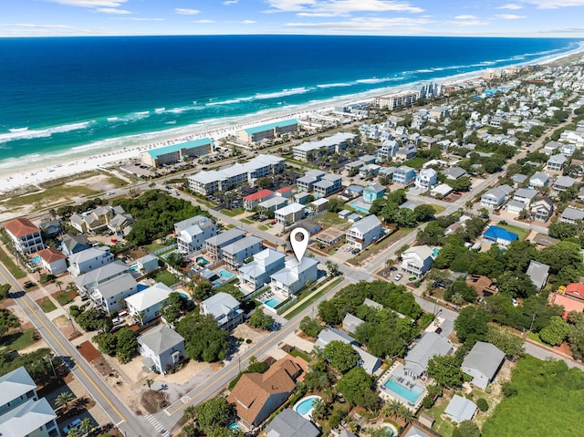 aerial view with a beach view and a water view