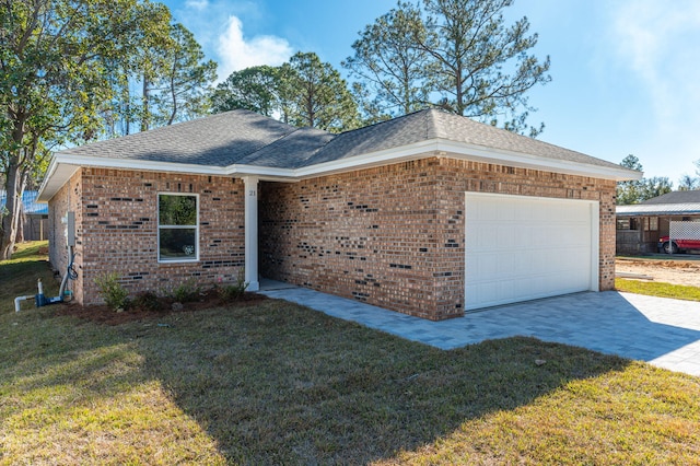 ranch-style house with a front yard and a garage