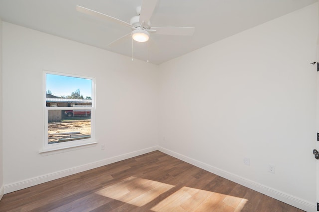 unfurnished room with ceiling fan and hardwood / wood-style flooring