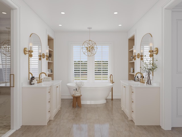 bathroom featuring a tub, built in features, tile patterned flooring, and vanity