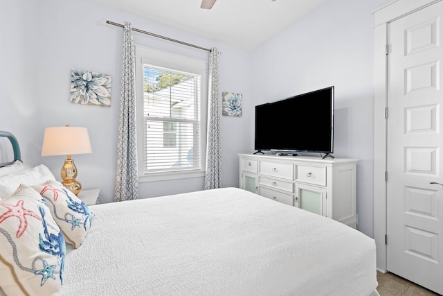 bedroom featuring ceiling fan and light hardwood / wood-style floors