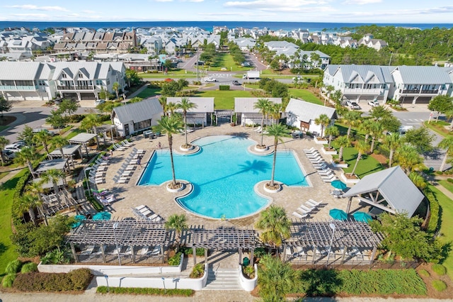 birds eye view of property with a water view