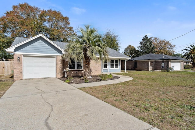 ranch-style home with a front yard and a garage