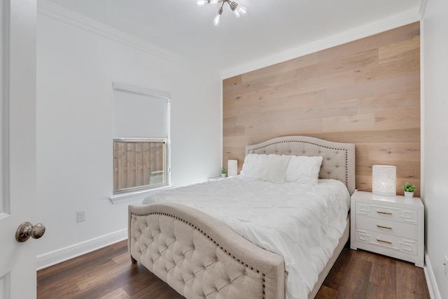 bedroom featuring dark wood-type flooring and crown molding