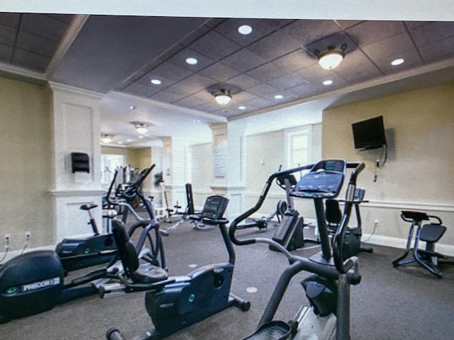 workout area with a paneled ceiling