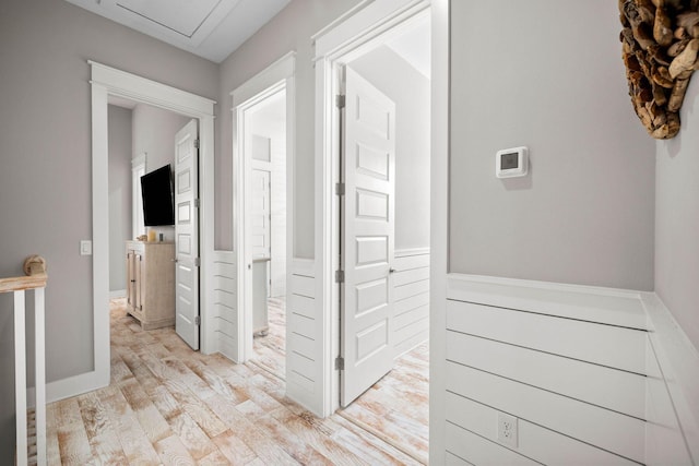 corridor featuring light hardwood / wood-style flooring