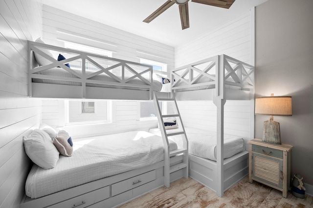 bedroom featuring ceiling fan and light hardwood / wood-style floors