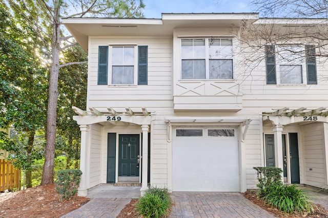 view of front of home with a garage