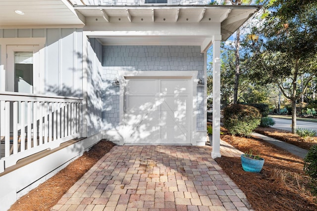 exterior space with a garage