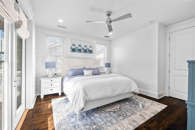 bedroom featuring dark wood-type flooring and ceiling fan