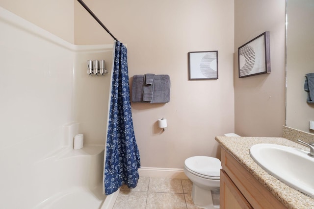 bathroom with toilet, tile patterned flooring, curtained shower, and vanity