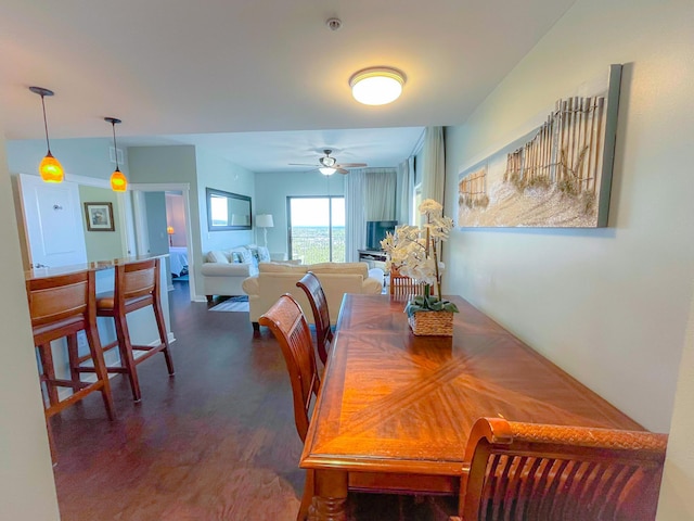 dining space with ceiling fan