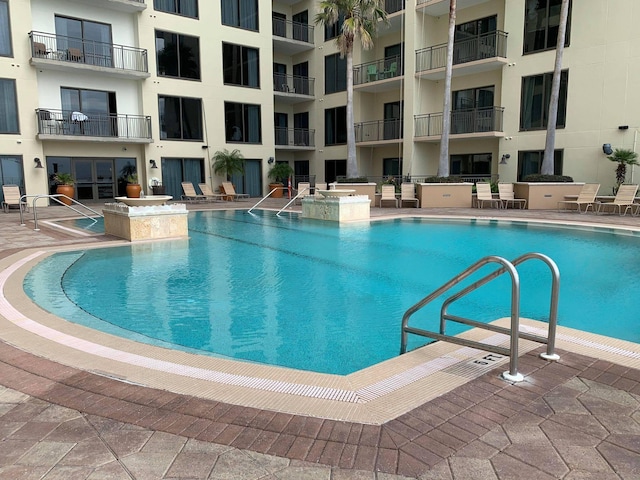 view of pool featuring a patio area