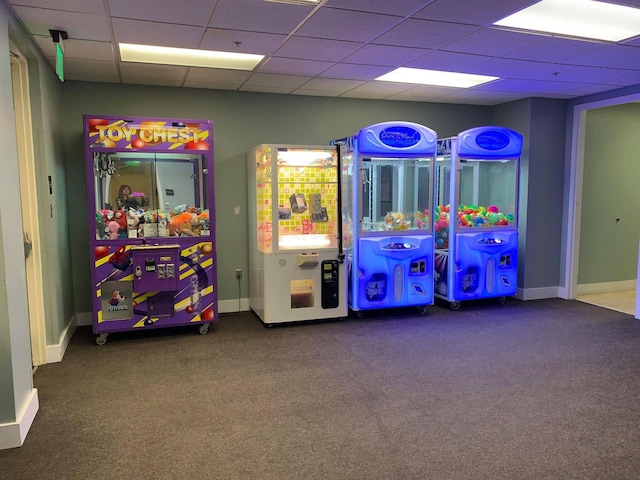 rec room with carpet flooring and a drop ceiling