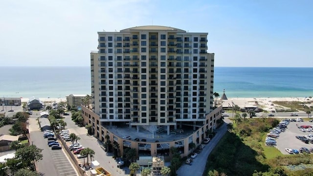 view of building exterior with a water view