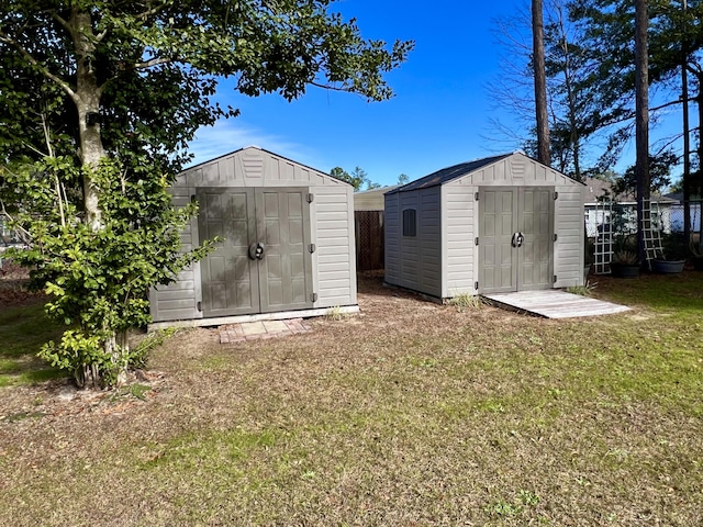 view of outdoor structure with a lawn