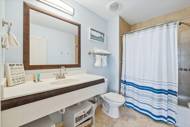 full bathroom with toilet, shower / tub combo, tile patterned floors, and sink