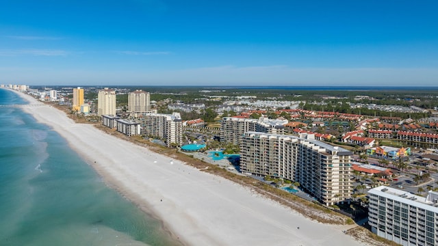 drone / aerial view with a water view and a view of the beach