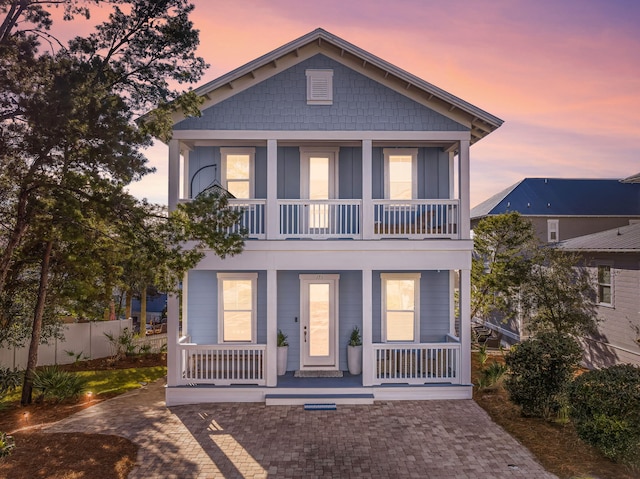 view of front facade featuring a porch and a balcony