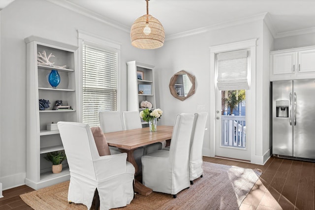 dining area with crown molding