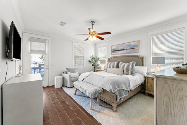 bedroom with ceiling fan, access to exterior, crown molding, and dark hardwood / wood-style floors