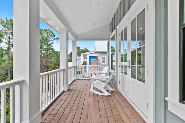 wooden deck with a porch