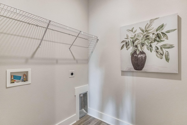 laundry room with hardwood / wood-style floors, electric dryer hookup, and washer hookup