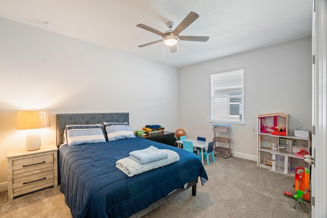 bedroom with ceiling fan and carpet