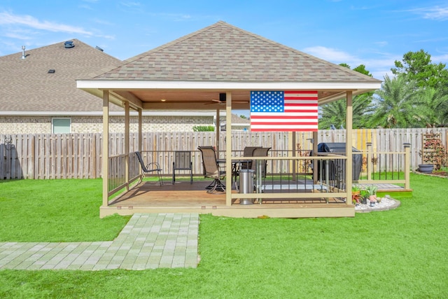 exterior space featuring area for grilling, a gazebo, and a lawn