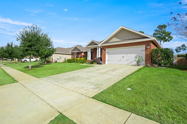 view of front of house featuring a front yard and a garage