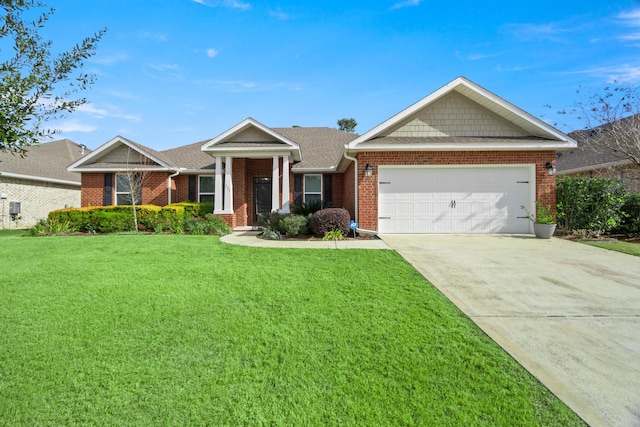 view of front of home featuring a garage and a front yard