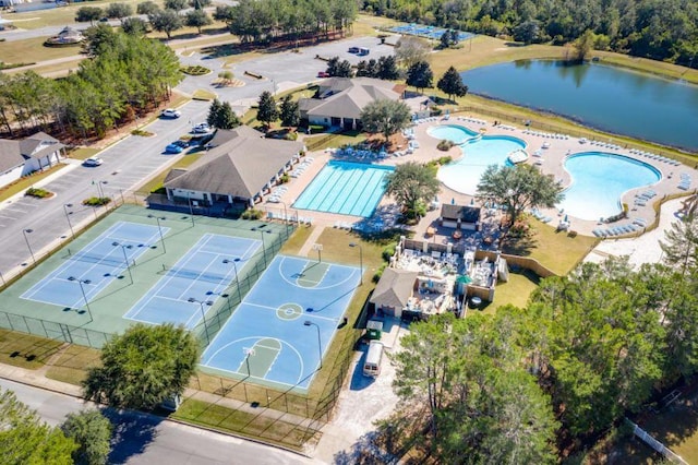 drone / aerial view with a water view