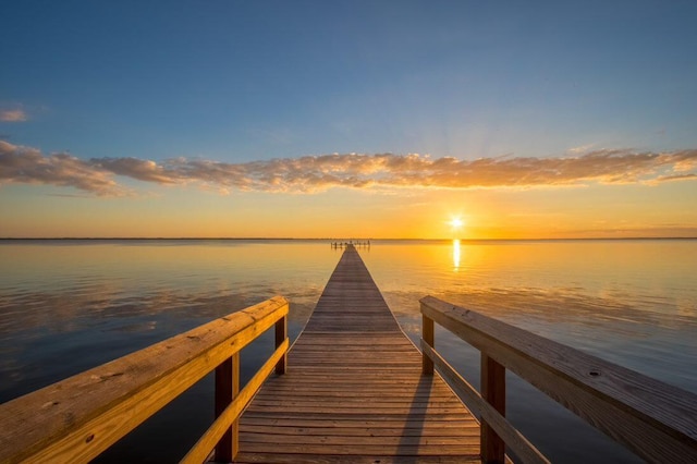 dock area featuring a water view